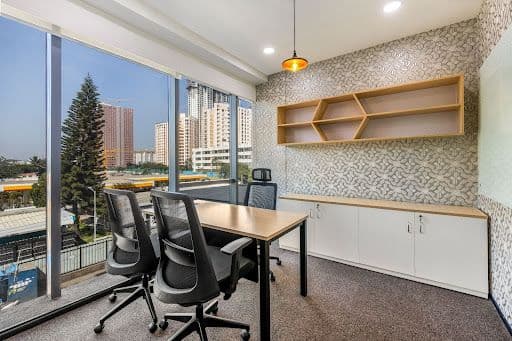Open office cabin with natural light and outdoor city view