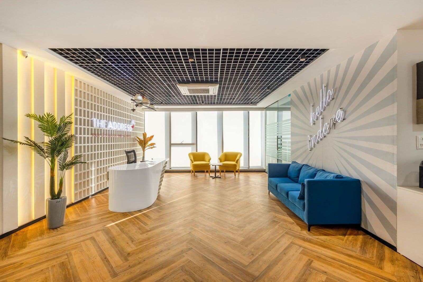 Modern reception with bold design and vibrant seating