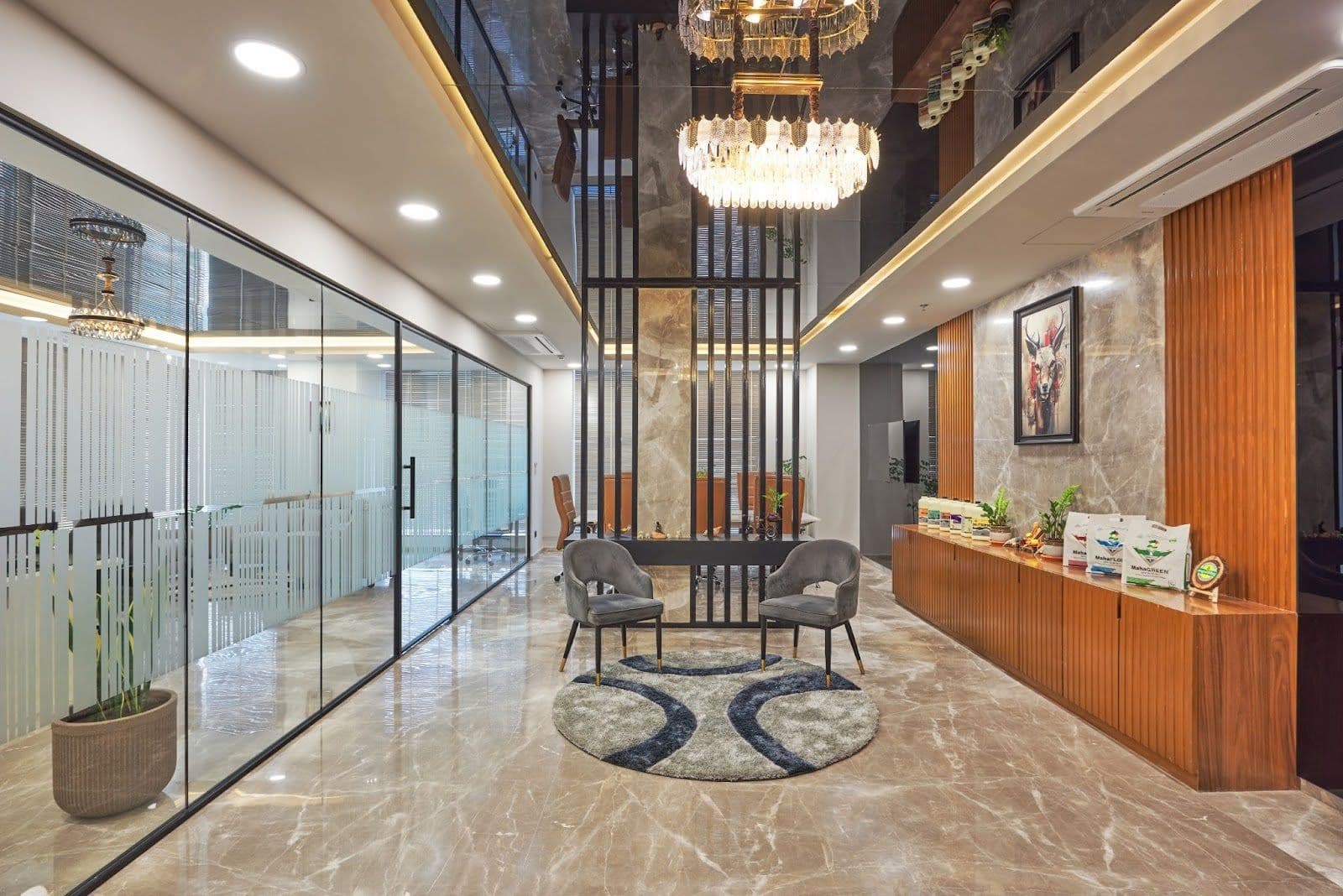 Elegant office reception with luxe furniture and marble finishes